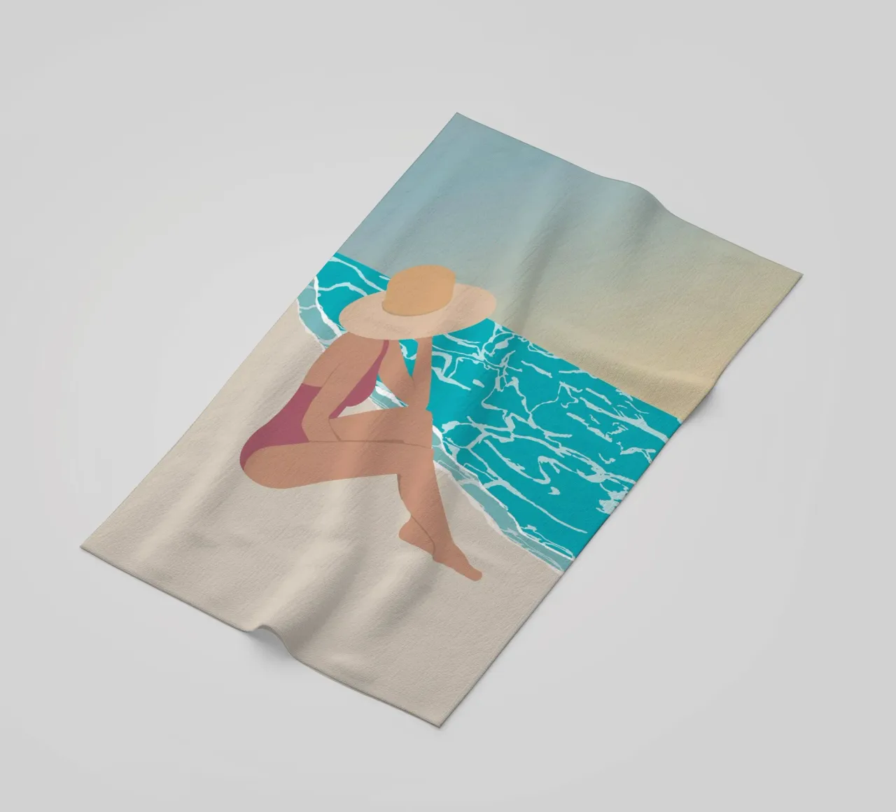 femme au chapeau assise sur la plage beach towel by alexiableu