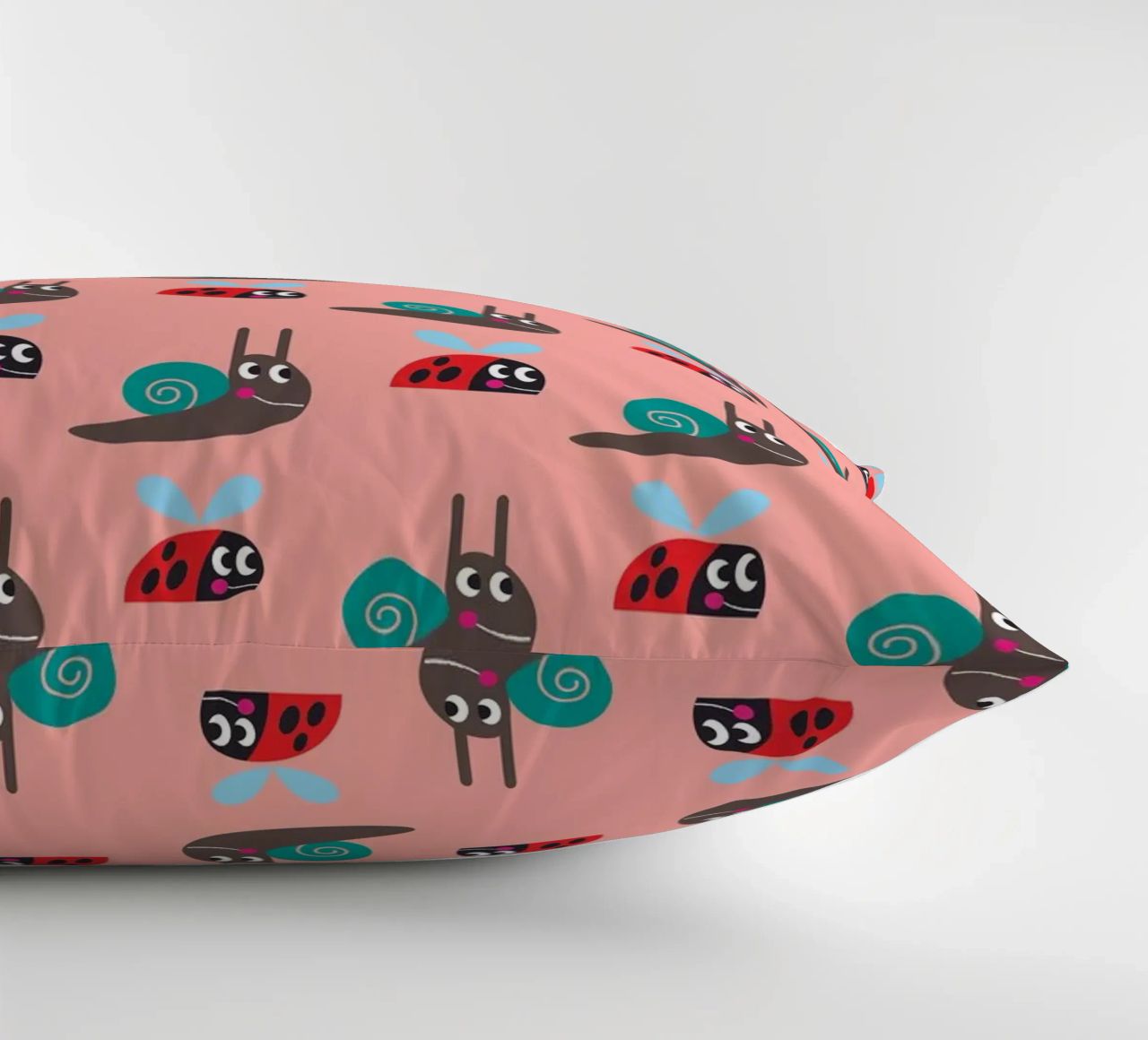 Lumaca e coccinella cuscino da Looks n Brains