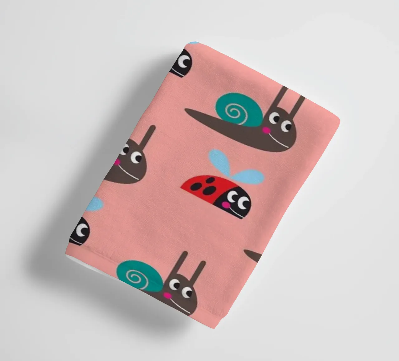 Snail and ladybird towel by Looks n Brains