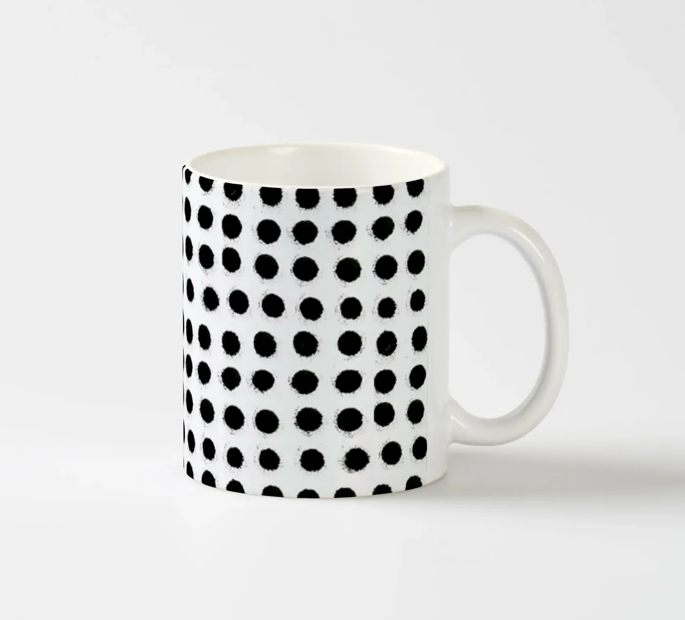 Ink Dots ceramic mug by Maren Gross