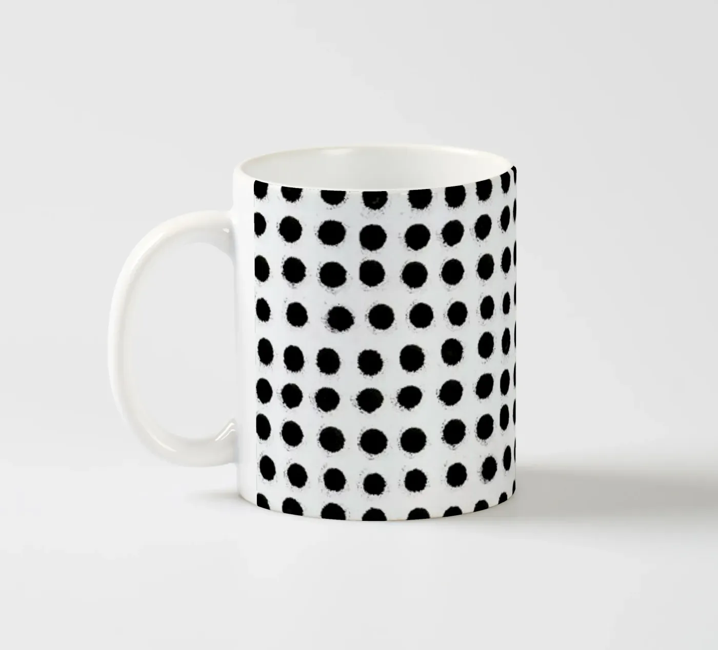 Ink Dots ceramic mug by Maren Gross