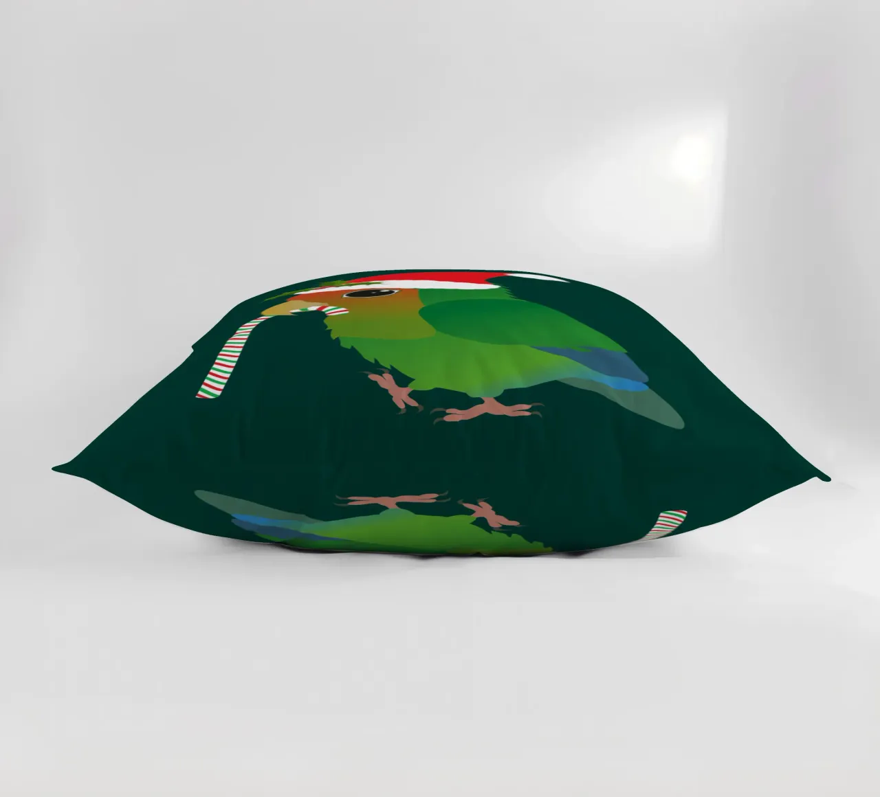 A cute Christmas peach faced lovebird decorative cushion by BwiseLizzy