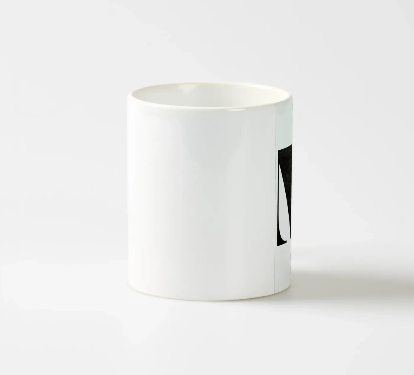 M ceramic mug by The Wall Shop