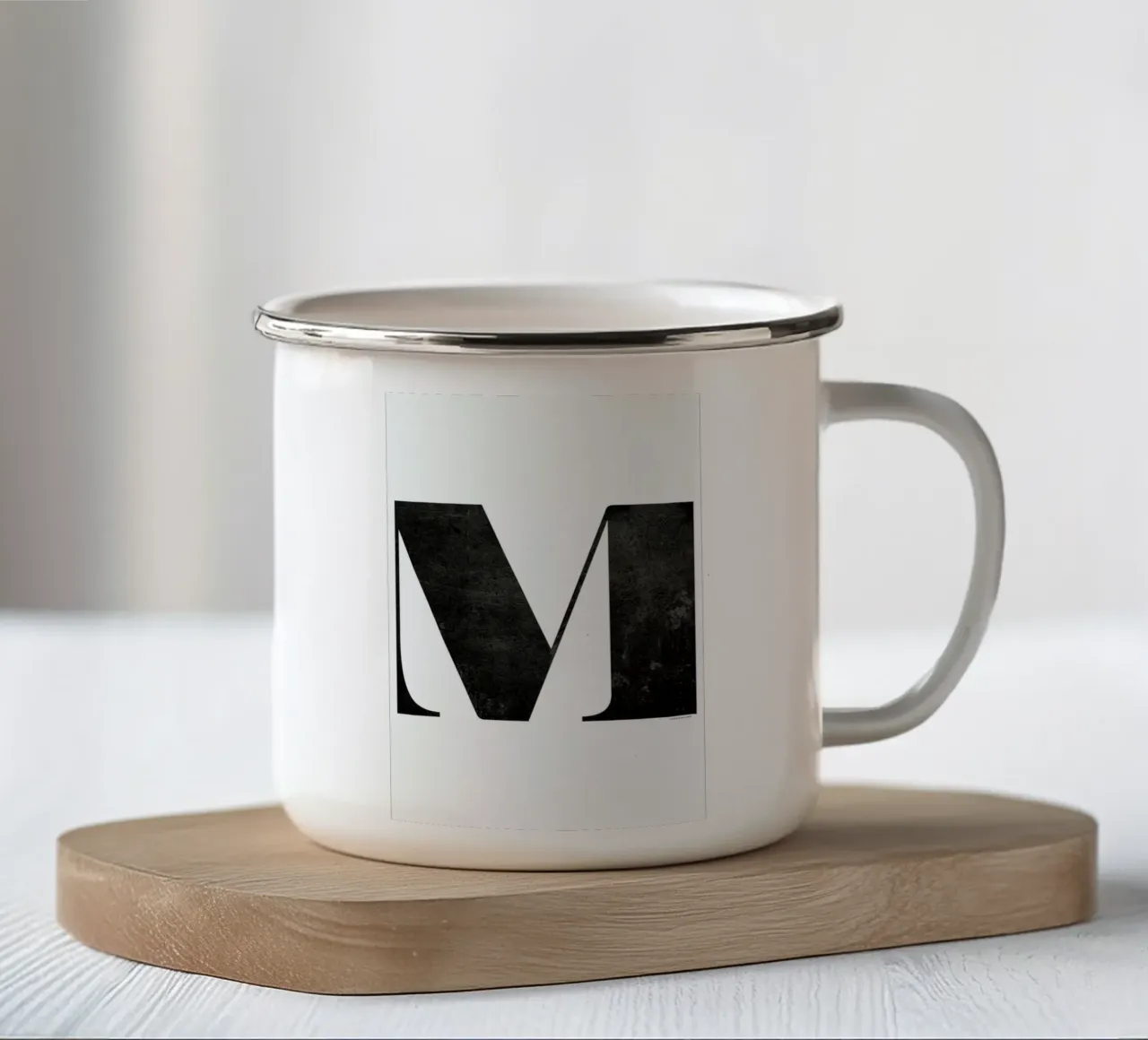 M taza de esmalte de The Wall Shop