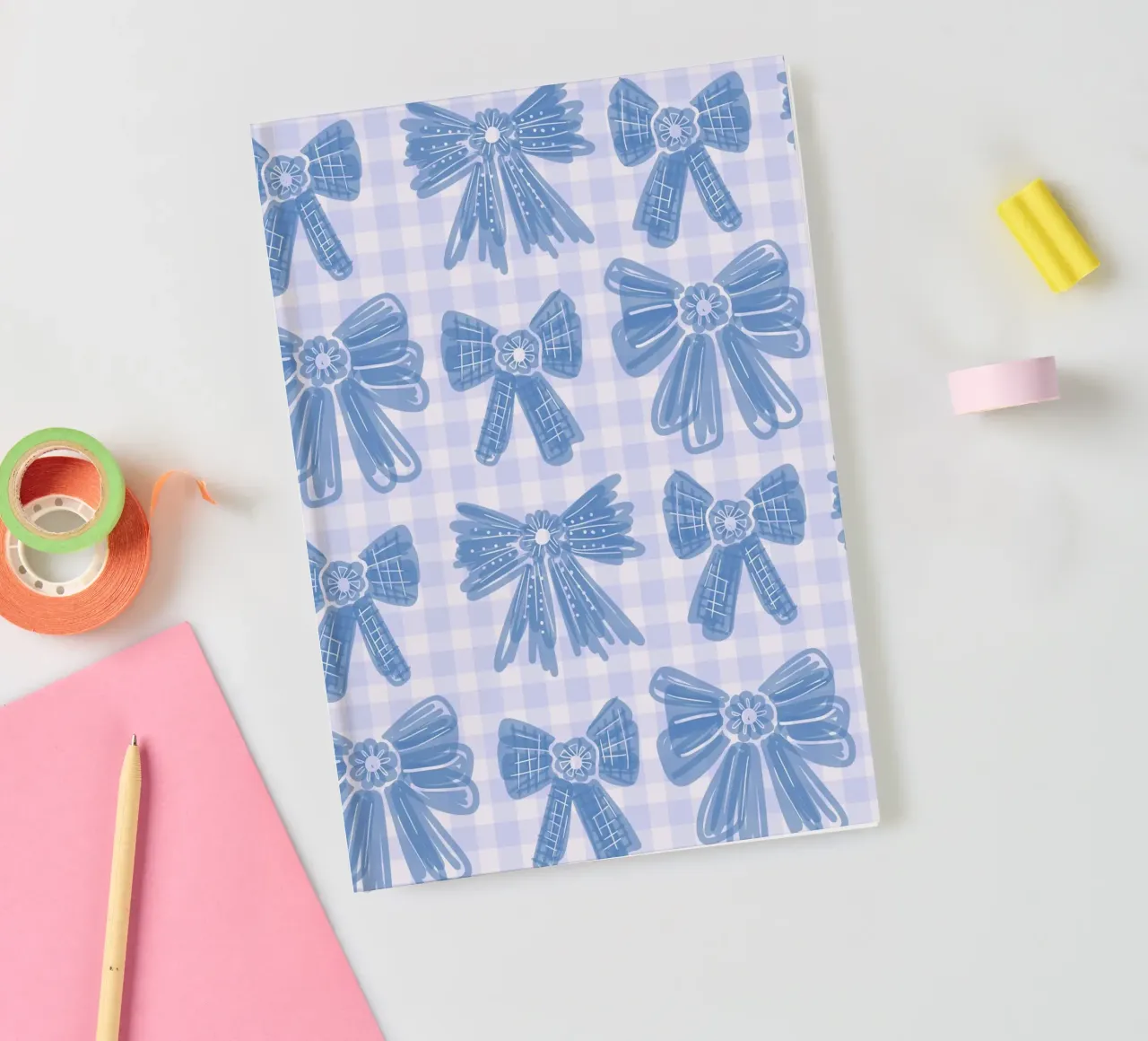 Blue Bows Gingham Pattern notebook by anisillustration