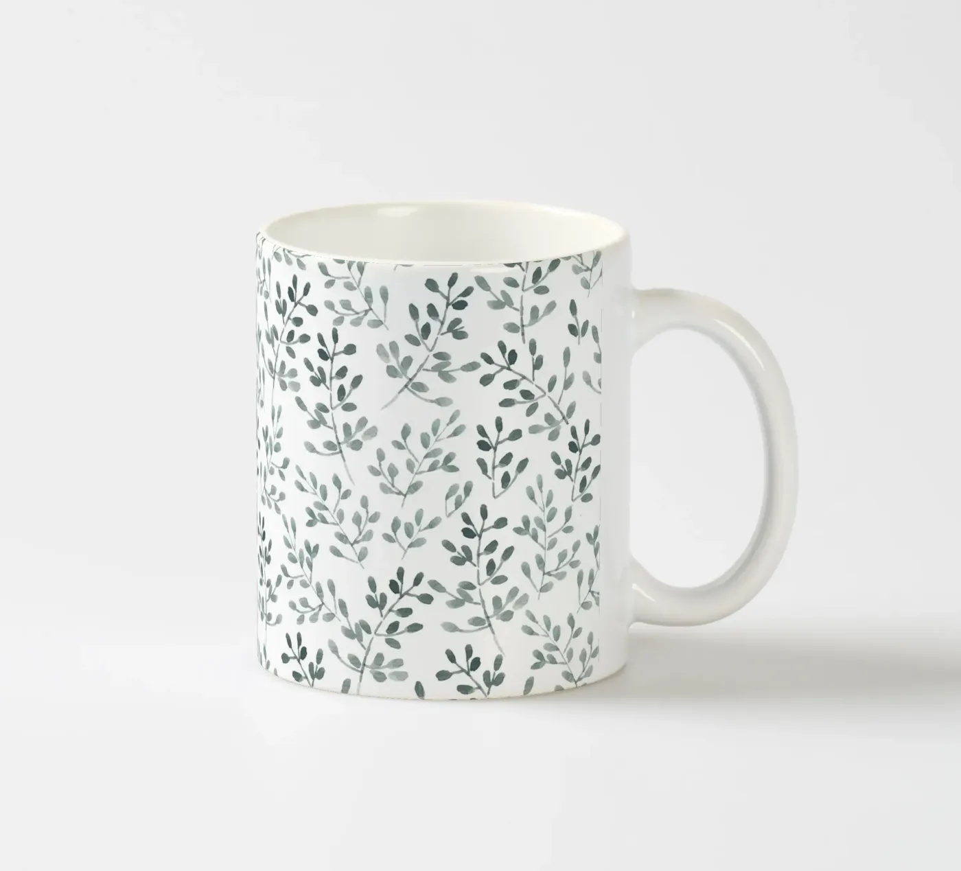 Tiny Leaves Green Pattern ceramic mug by anisillustration