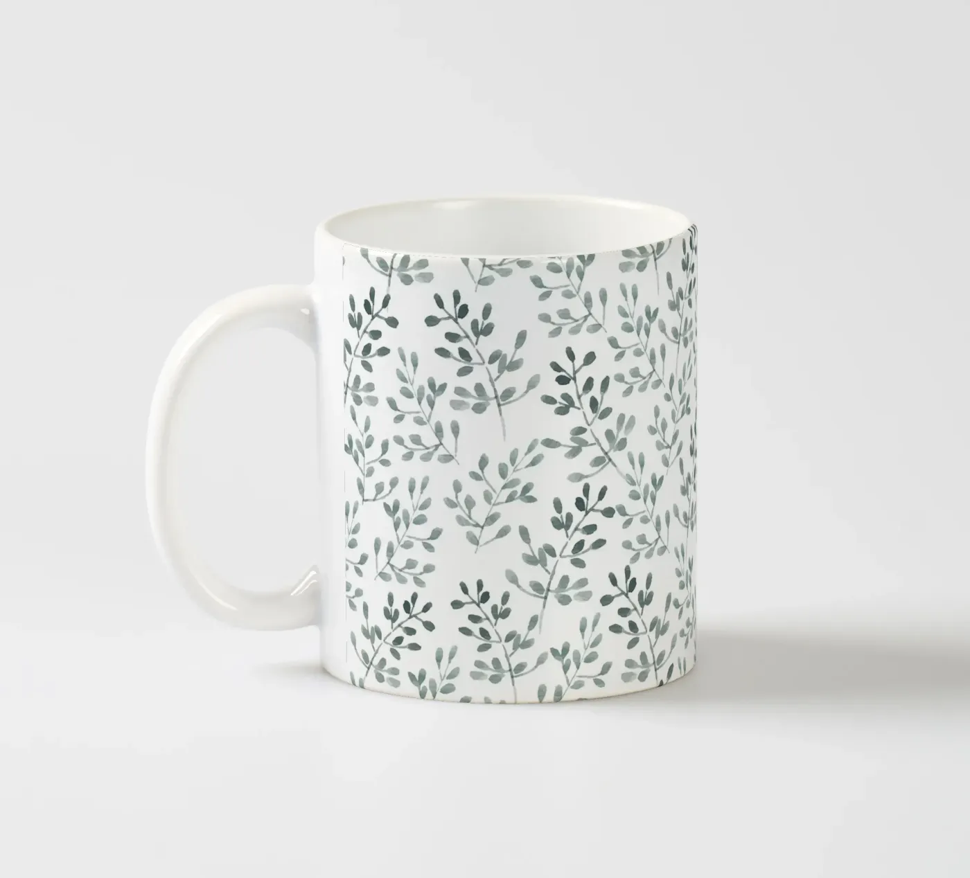 Tiny Leaves Green Pattern Keramik Tasse von anisillustration
