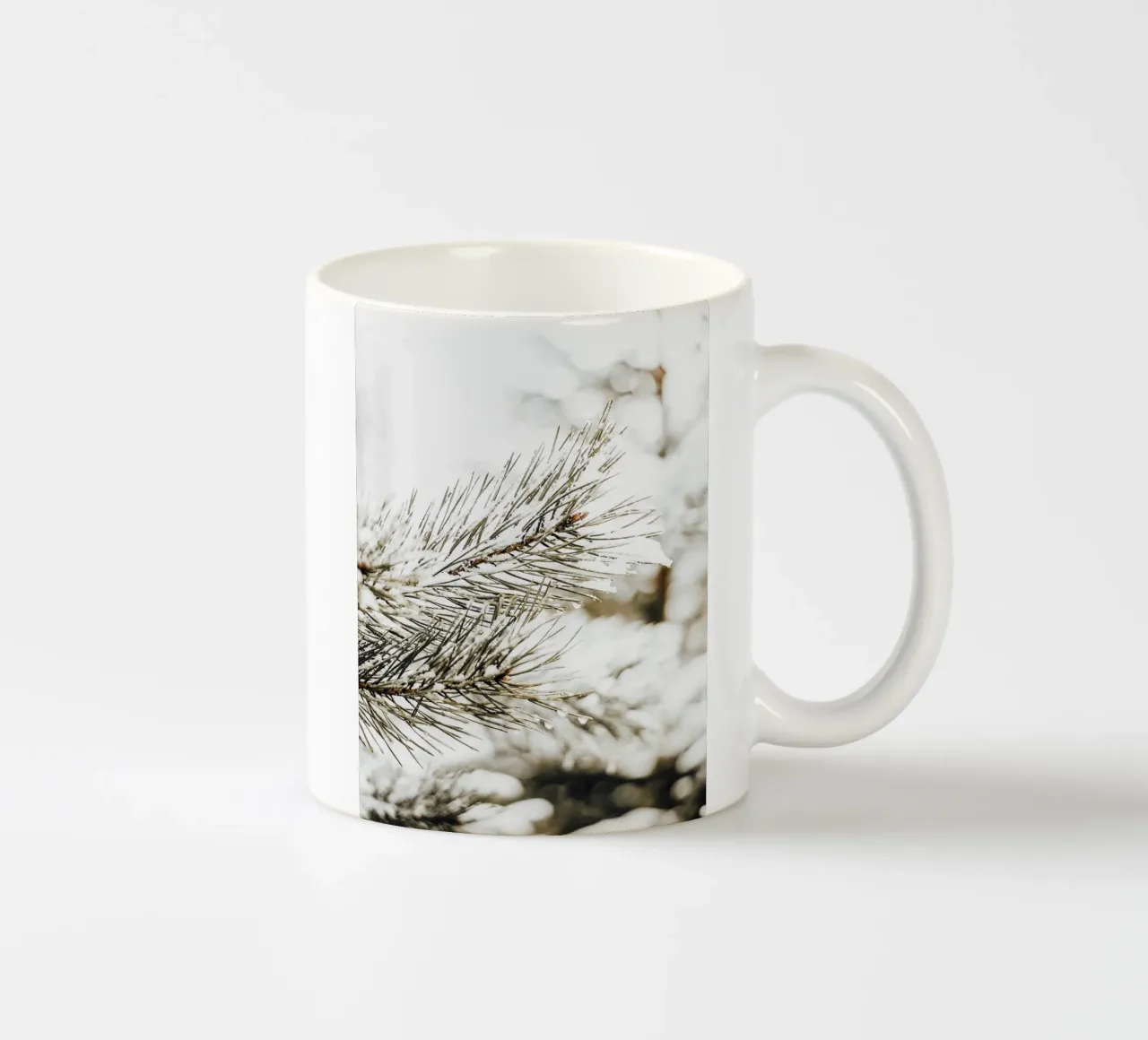 Snowy Fir Branch - Winter Botanical Art Print ceramic mug by Whole©