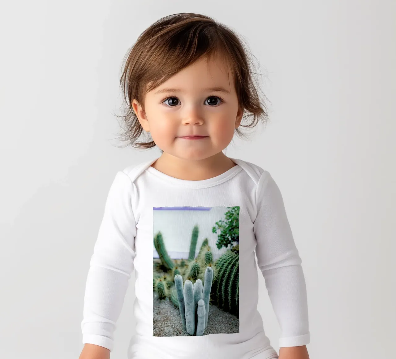 Marrakesh Paradise 7 long-sleeve baby romper by Paul Aidan Perry