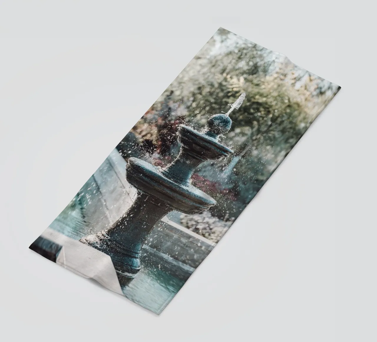 Fountain Relaxation oasis beach towel by Carinaprint