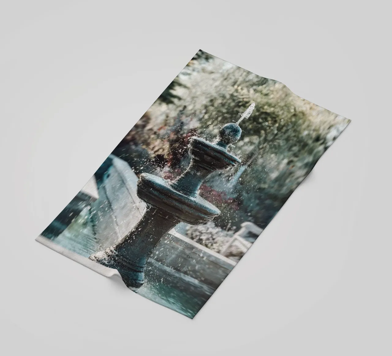 Fountain Relaxation oasis beach towel by Carinaprint