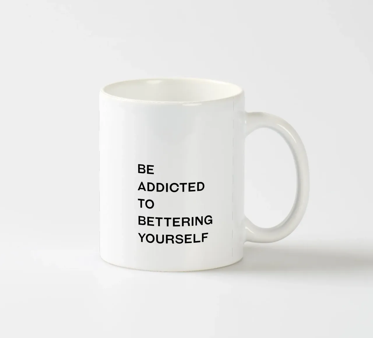 Sei süchtig danach, dich zu verbessern Zitat Keramik Tasse von Paigaam Studio