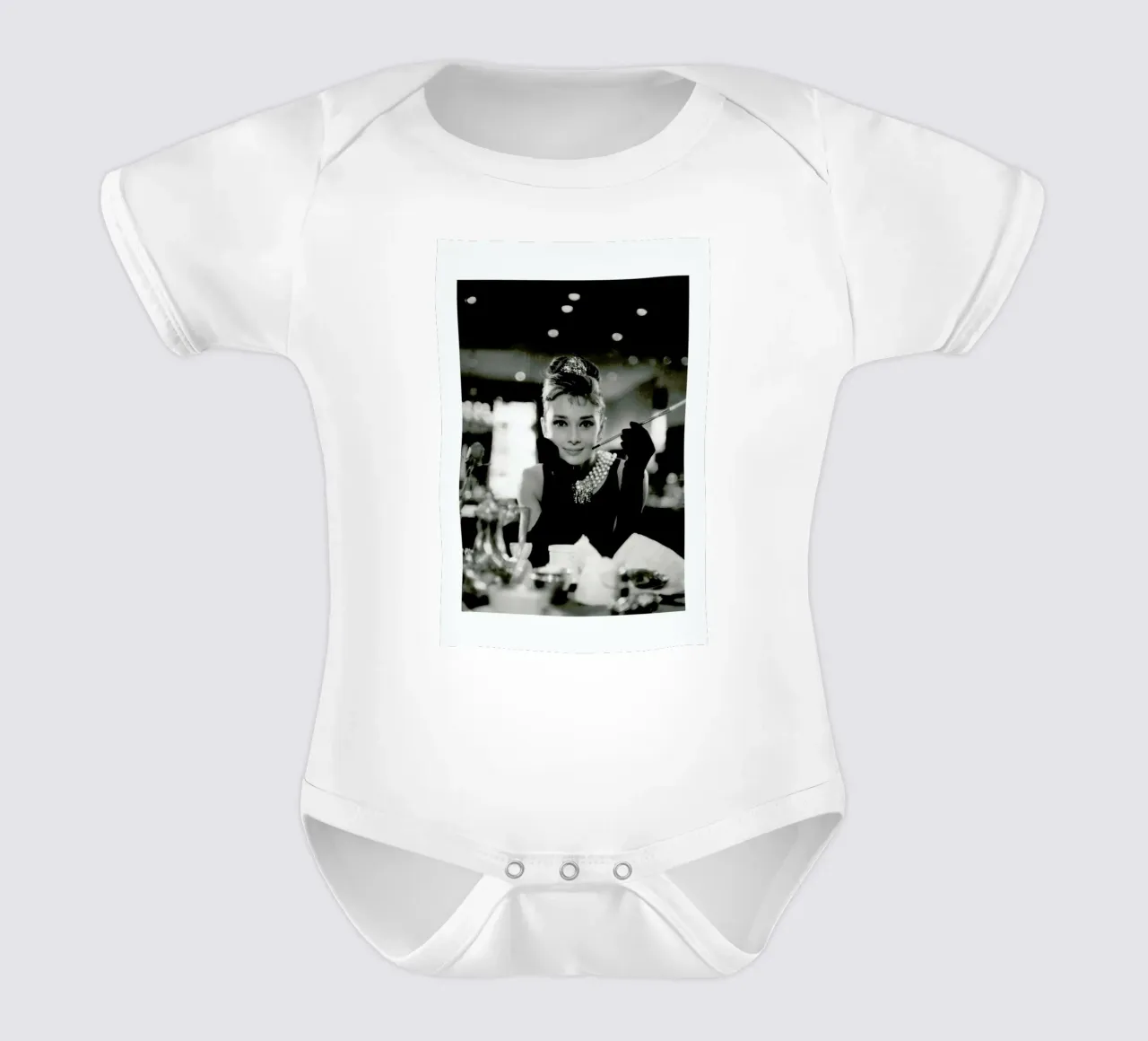 Audrey Hepburn in Breakfast at Tiffany's, 1961 short-sleeve baby romper by Gallery Print and Art Limited