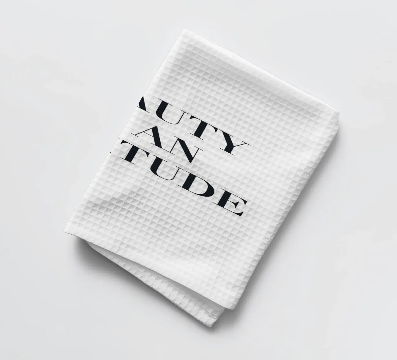 La beauté est une attitude - Déclaration typographique torchon de Whole©