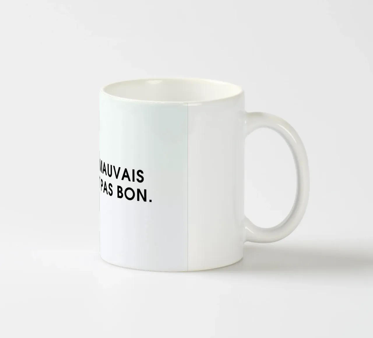 C'est pas mauvais mais c'est pas bon - White tazza in ceramica da Intertitres