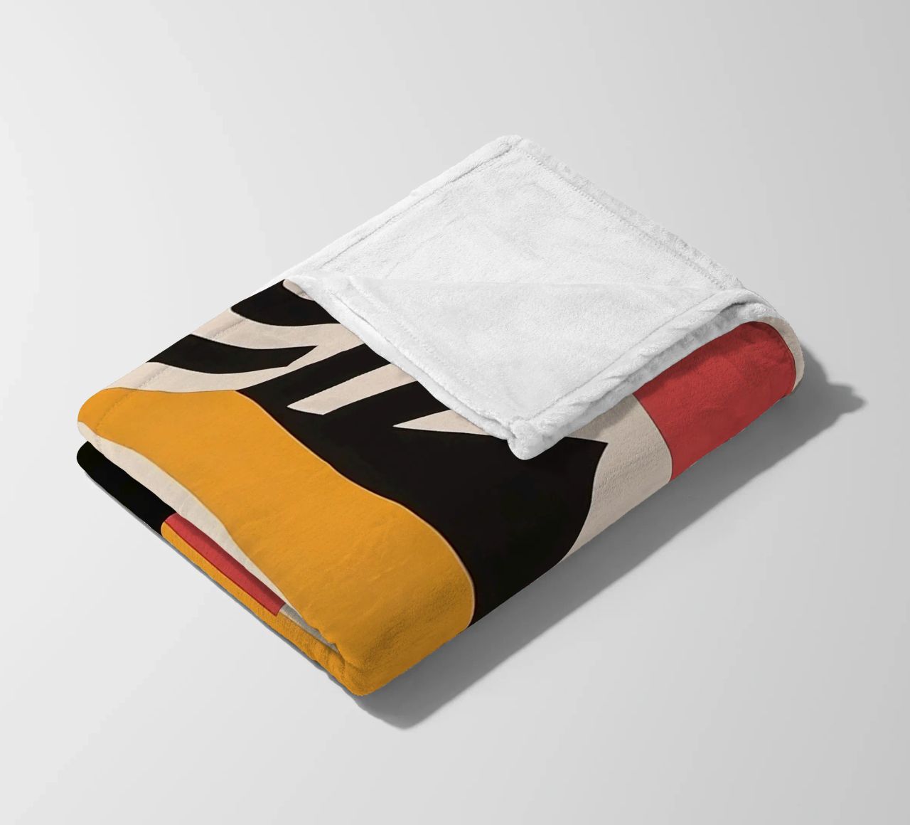 Design dynamics: the energy of the Bauhaus fleece blanket by Nikis Art Studio