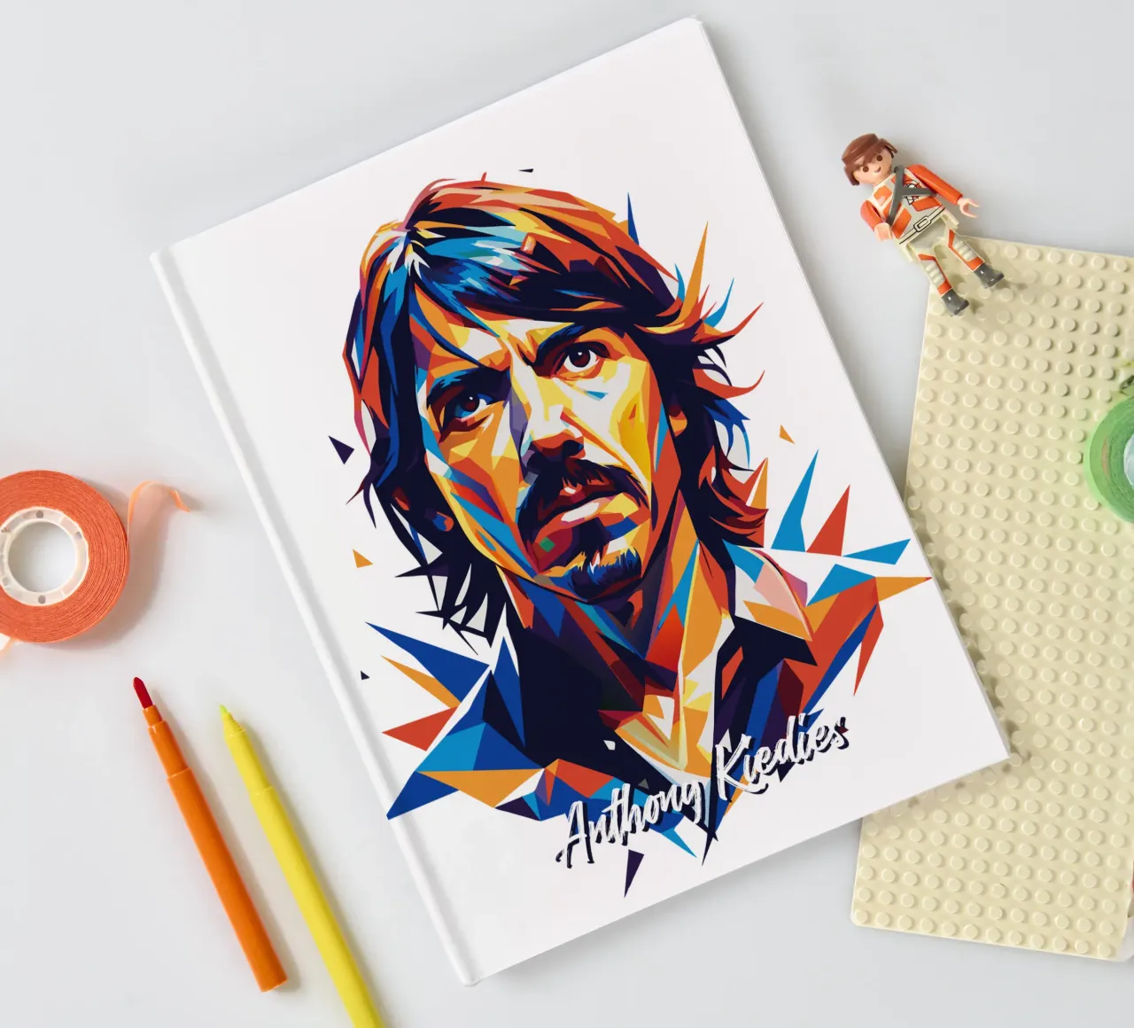 Anthony Kiedies portrait in WPAP Pop Art notebook by vectorartnesia