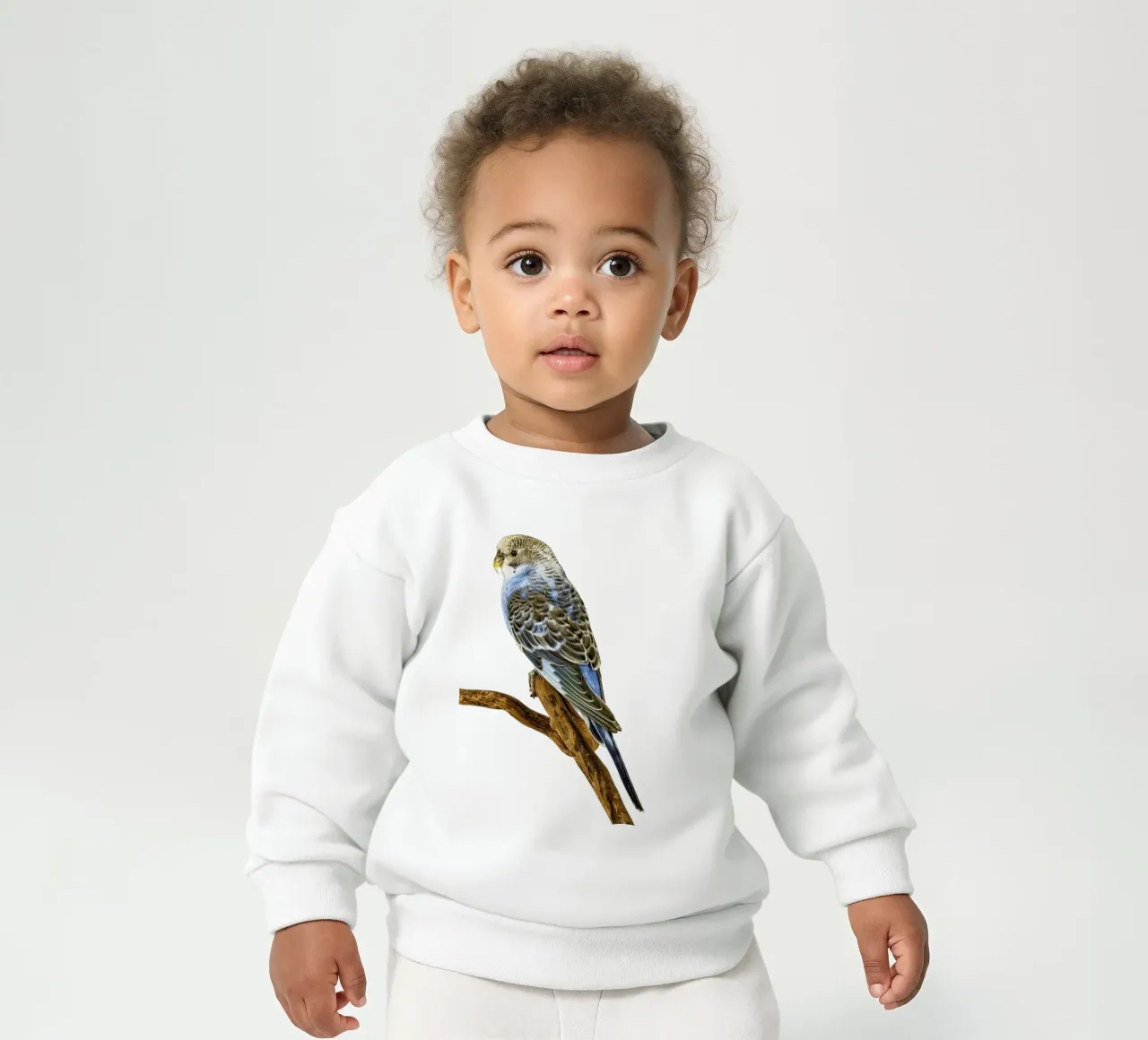 Pappagallini felpa neonato da Curious Collections by Marielle Leenders