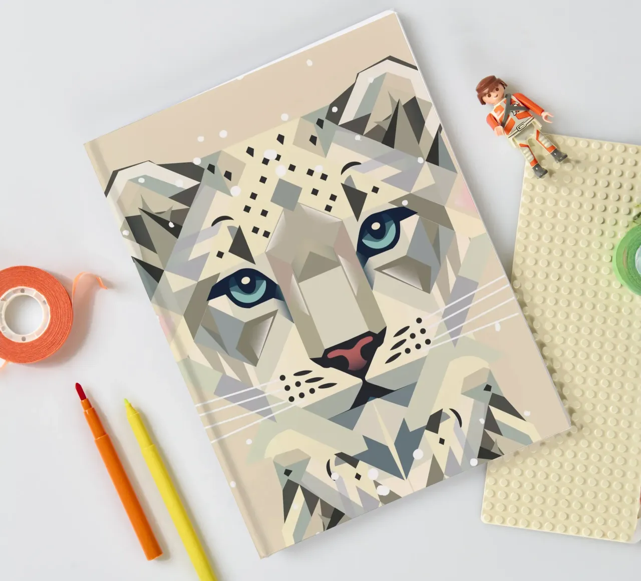 Geometric snow leopard - strong elegance in the wild notebook by namosh