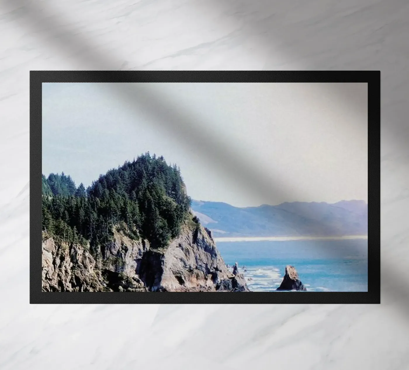 Cape Falcon doormat by Leah Flores