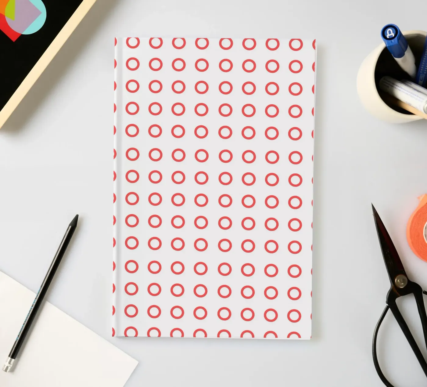 Red dots pattern notebook by Happypatterns