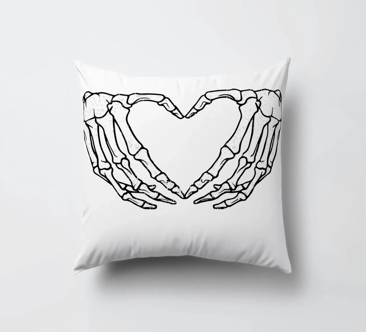 skeletal hands forms a heart cuscino da edsonramosart