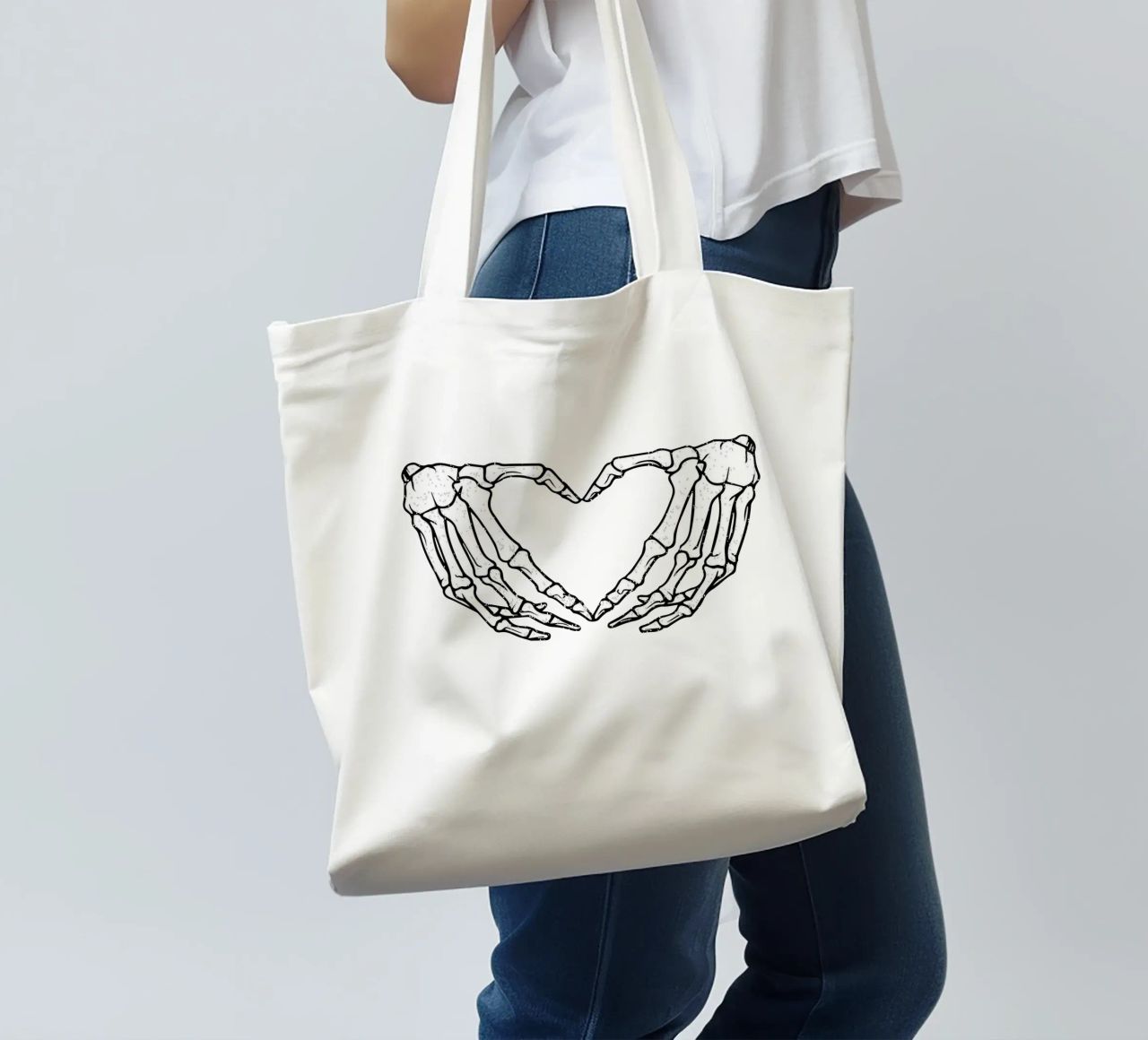 skeletal hands forms a heart borsa in juta da edsonramosart
