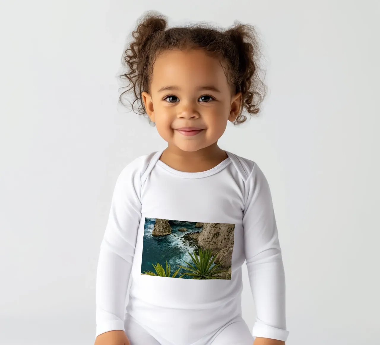 Coast Malta long-sleeve baby romper by Curious Collections by Marielle Leenders