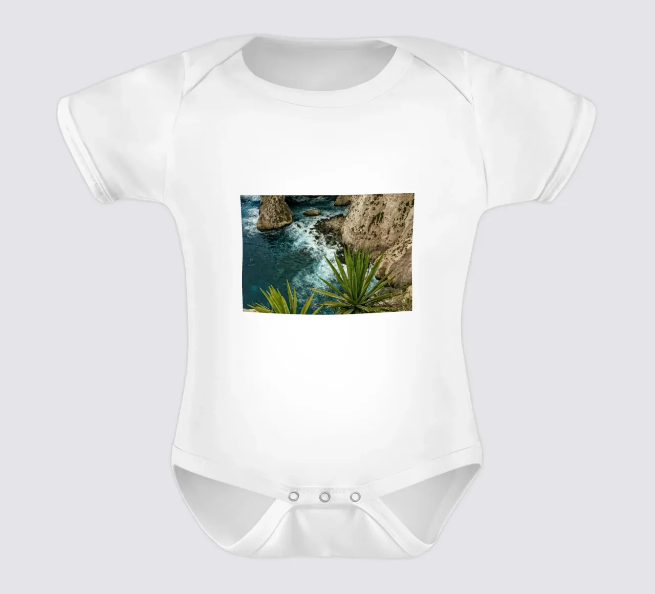 Coast Malta short-sleeve baby romper by Curious Collections by Marielle Leenders