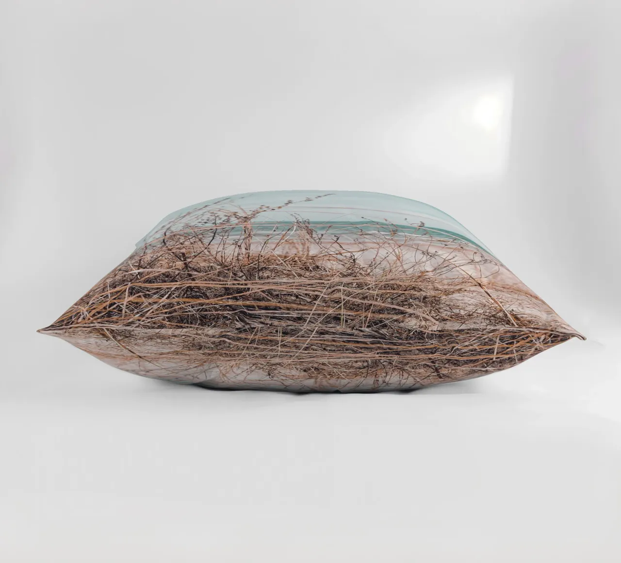 Coastal grass in the wind - design in harmony with nature decorative cushion by Whole©