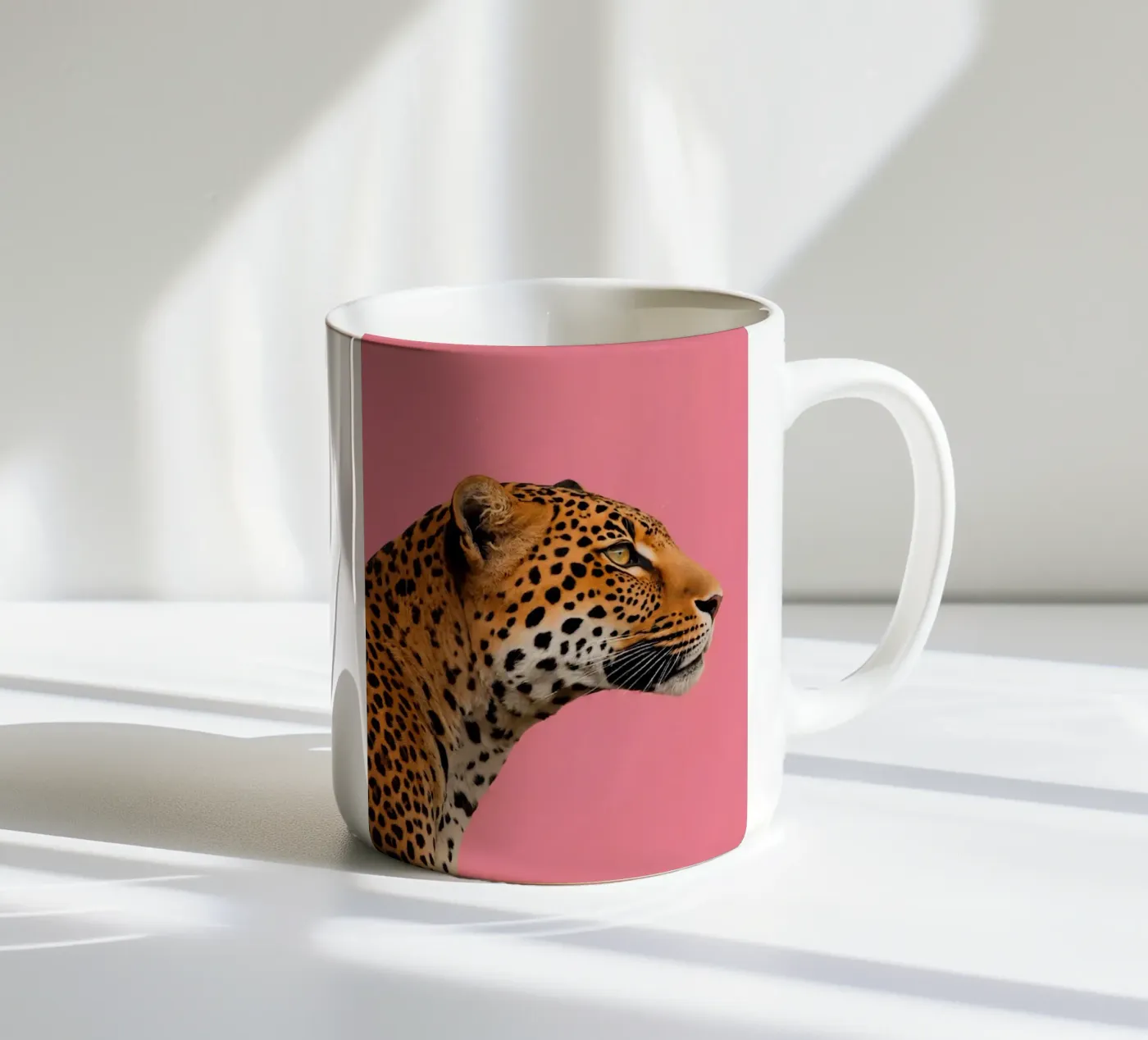 Leopard pink background ceramic mug by Eliban