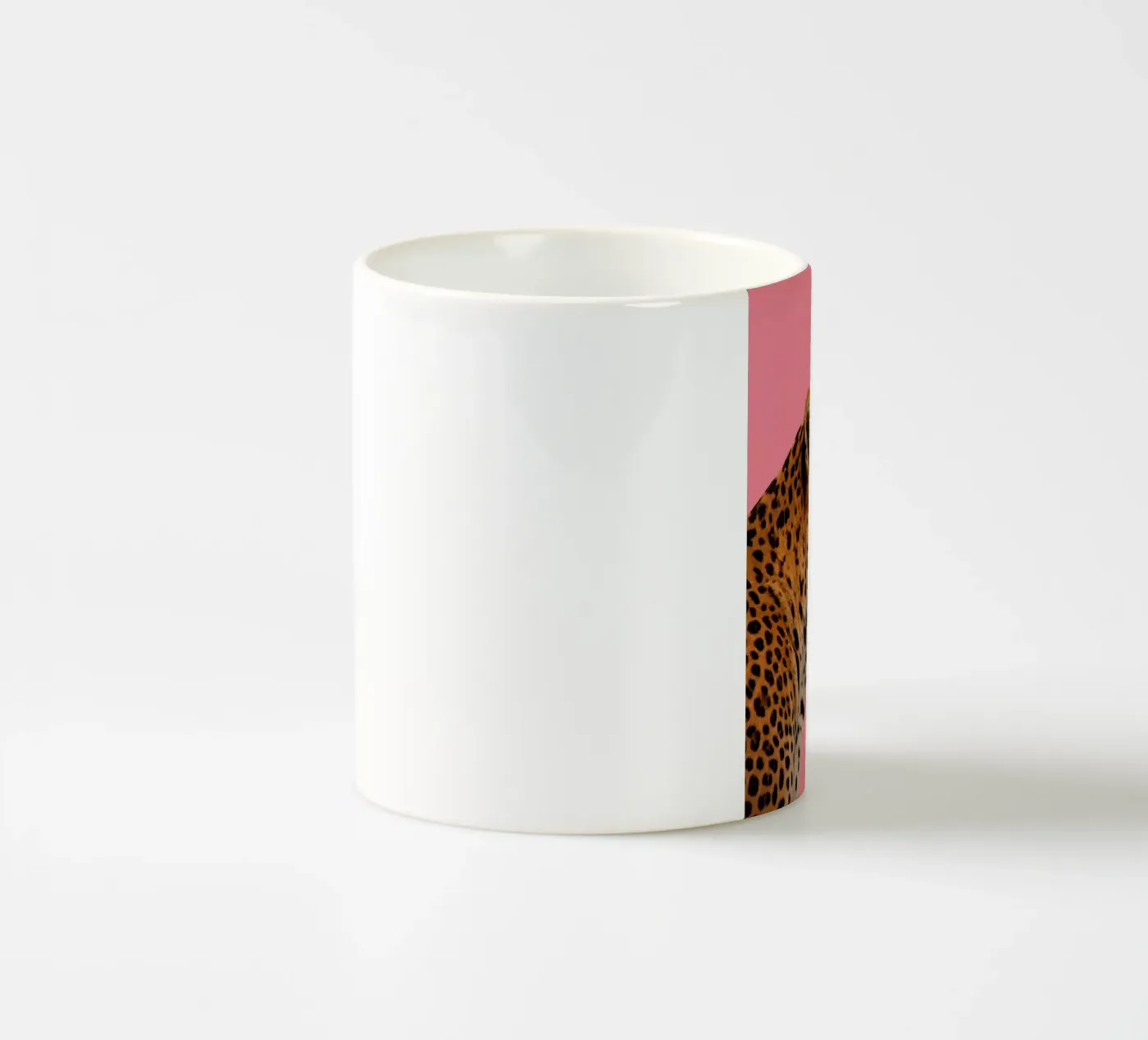Leopard pink background ceramic mug by Eliban