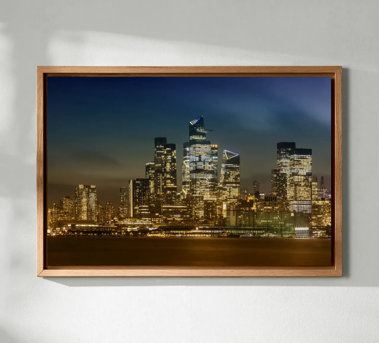 Striking NYC skyline with Hudson Yards in the evening canvas with Floater frame by Melanie Viola
