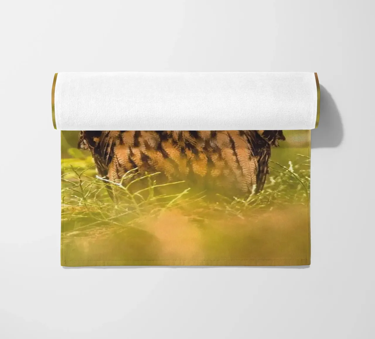 Eagle Owl beach towel by Dave Hare Photography