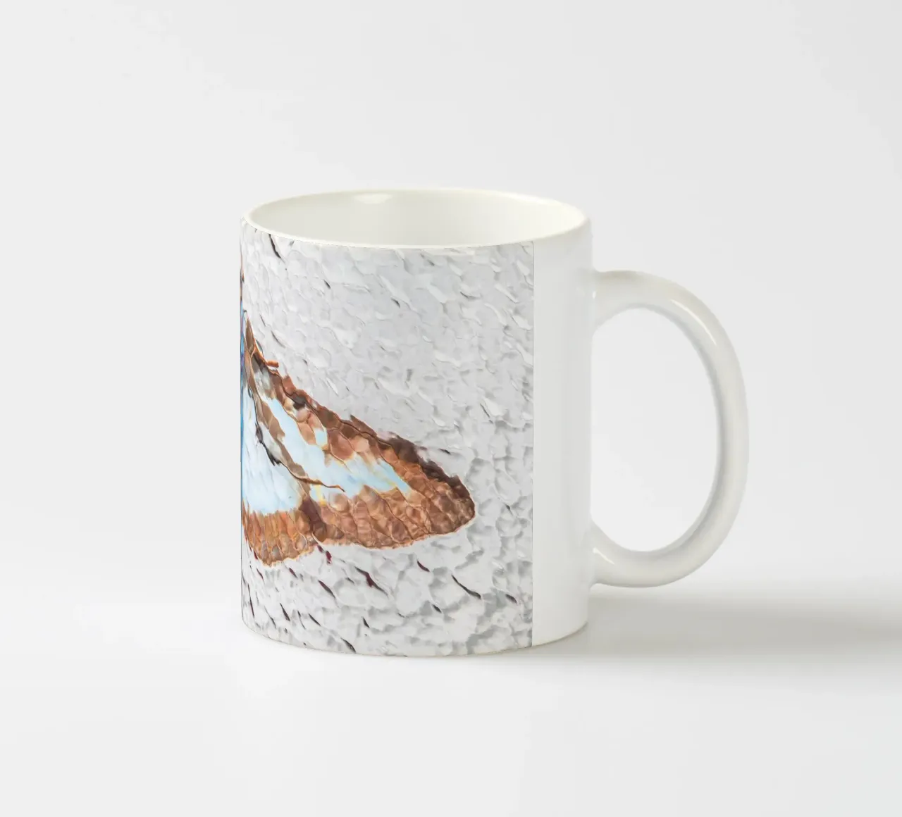 Moth ceramic mug by Dave Hare Photography
