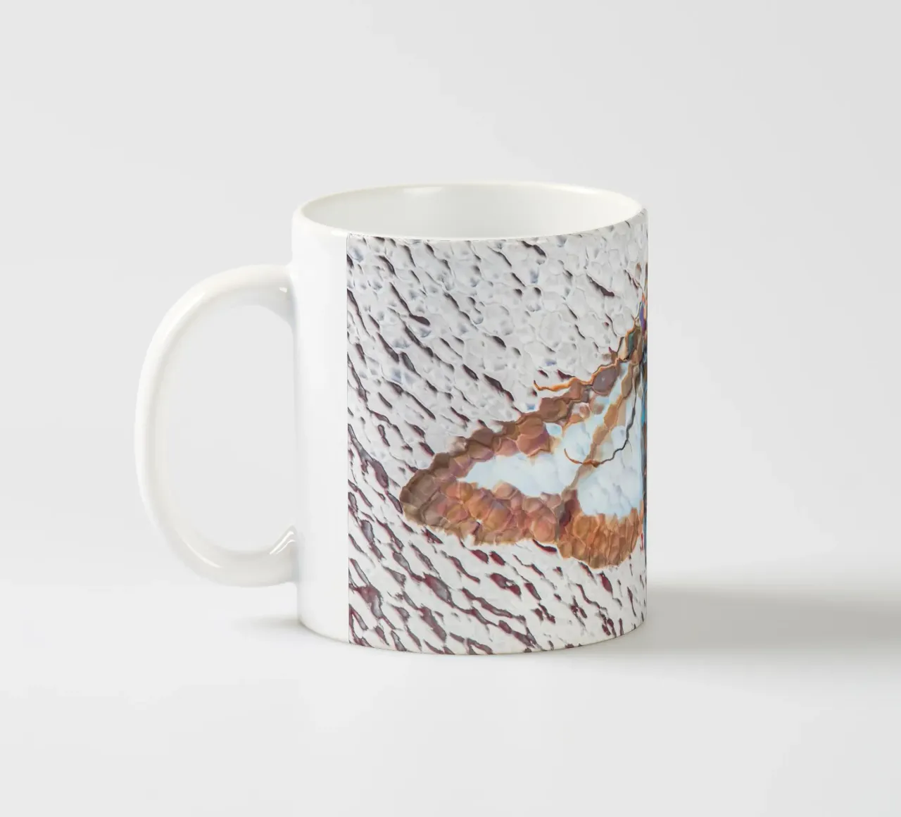 Moth ceramic mug by Dave Hare Photography