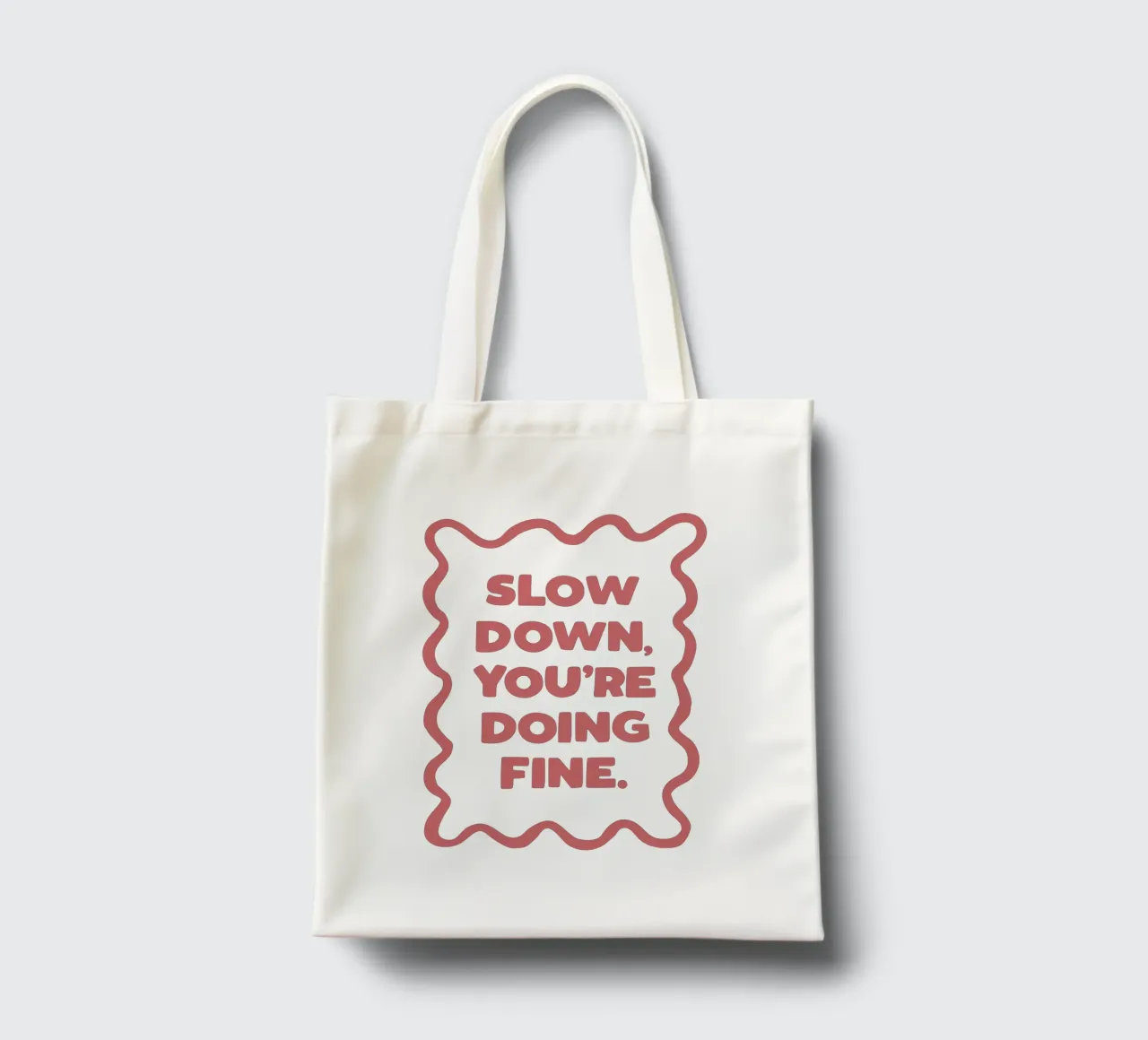 Slow Down You're Doing Fine Typografie Design in PInk borsa in juta da THE MOTIVATED TYPE