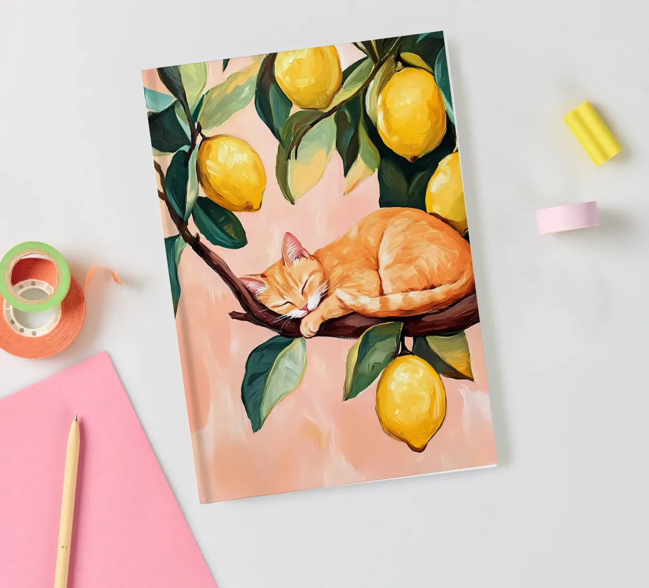Sleeping red cat on Lemon tree notebook by IamHomeStudio