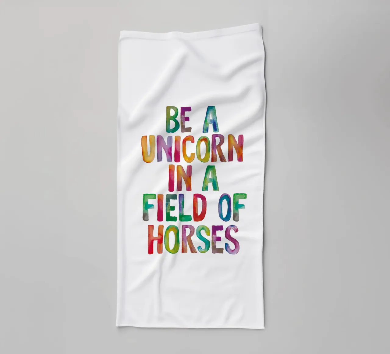 Be a Unicorn in a Field of Horses Rainbow Typography towel by THE MOTIVATED TYPE