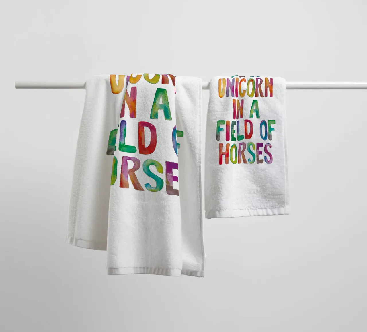 Be a Unicorn in a Field of Horses Rainbow Typography towel by THE MOTIVATED TYPE