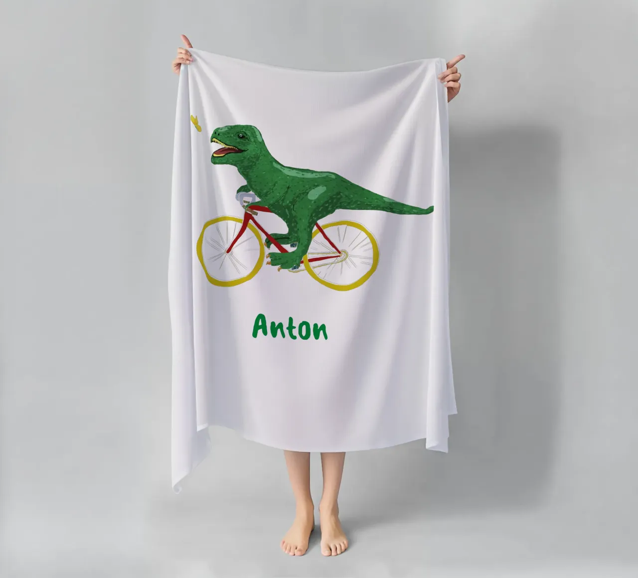 Dino in bicicletta telo mare da Illustration Raissa Oltmanns