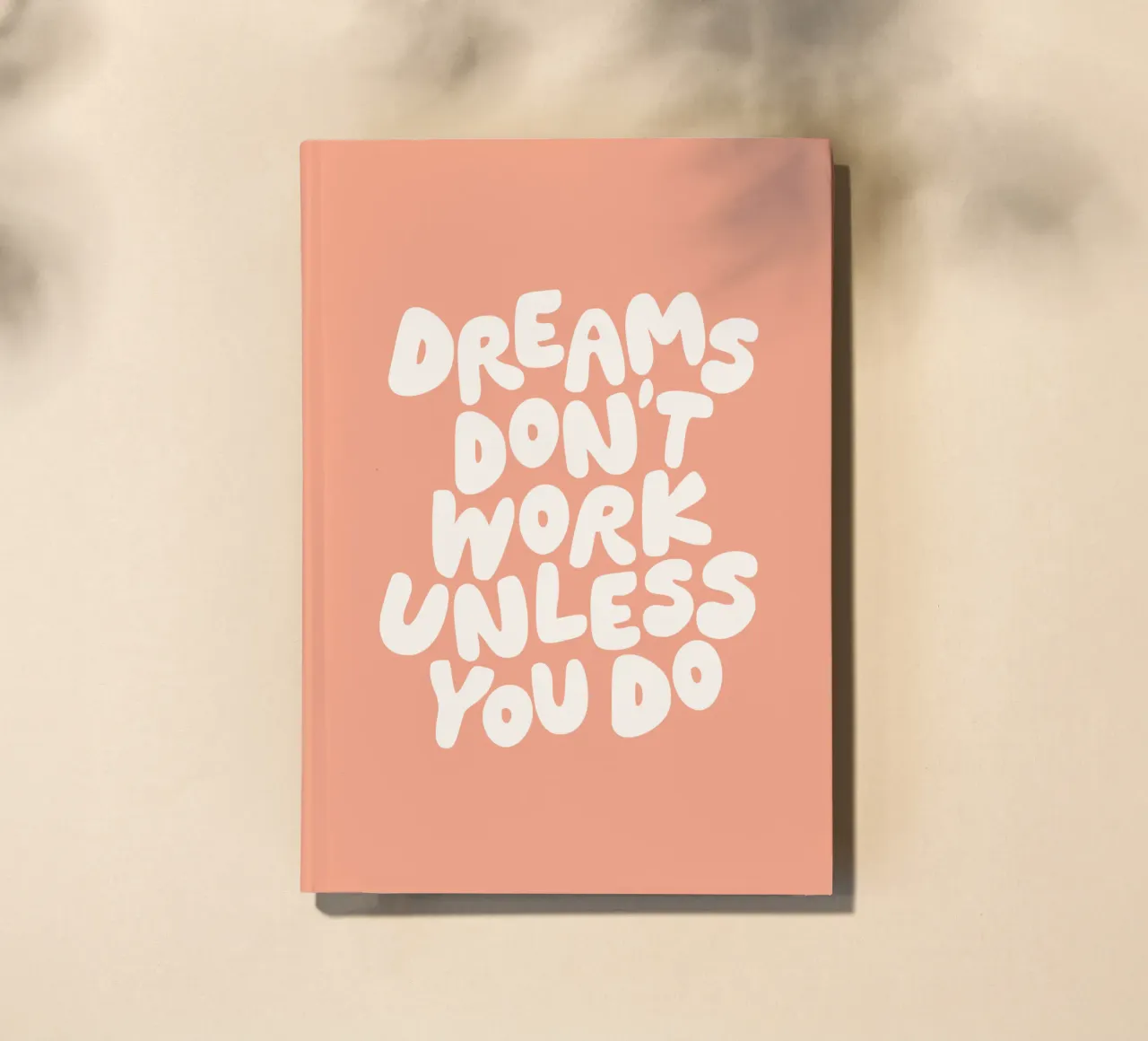 Dreams Don't Work Unless You Do Typografie Design in Peach notebook by THE MOTIVATED TYPE