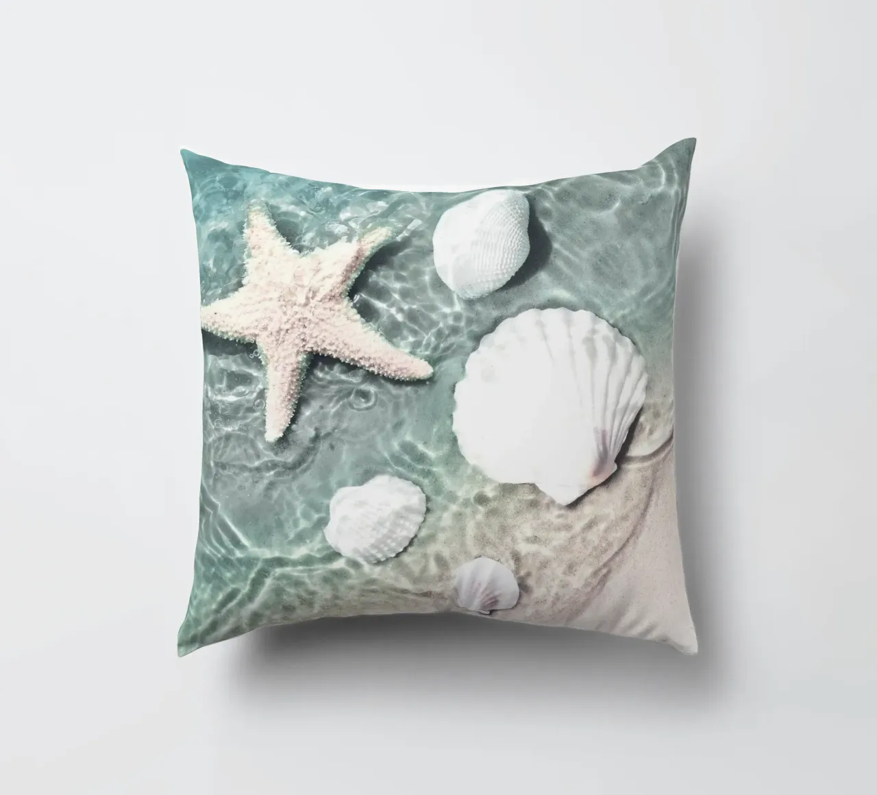 Shells and starfish - maritime summer design decorative cushion by Whole©