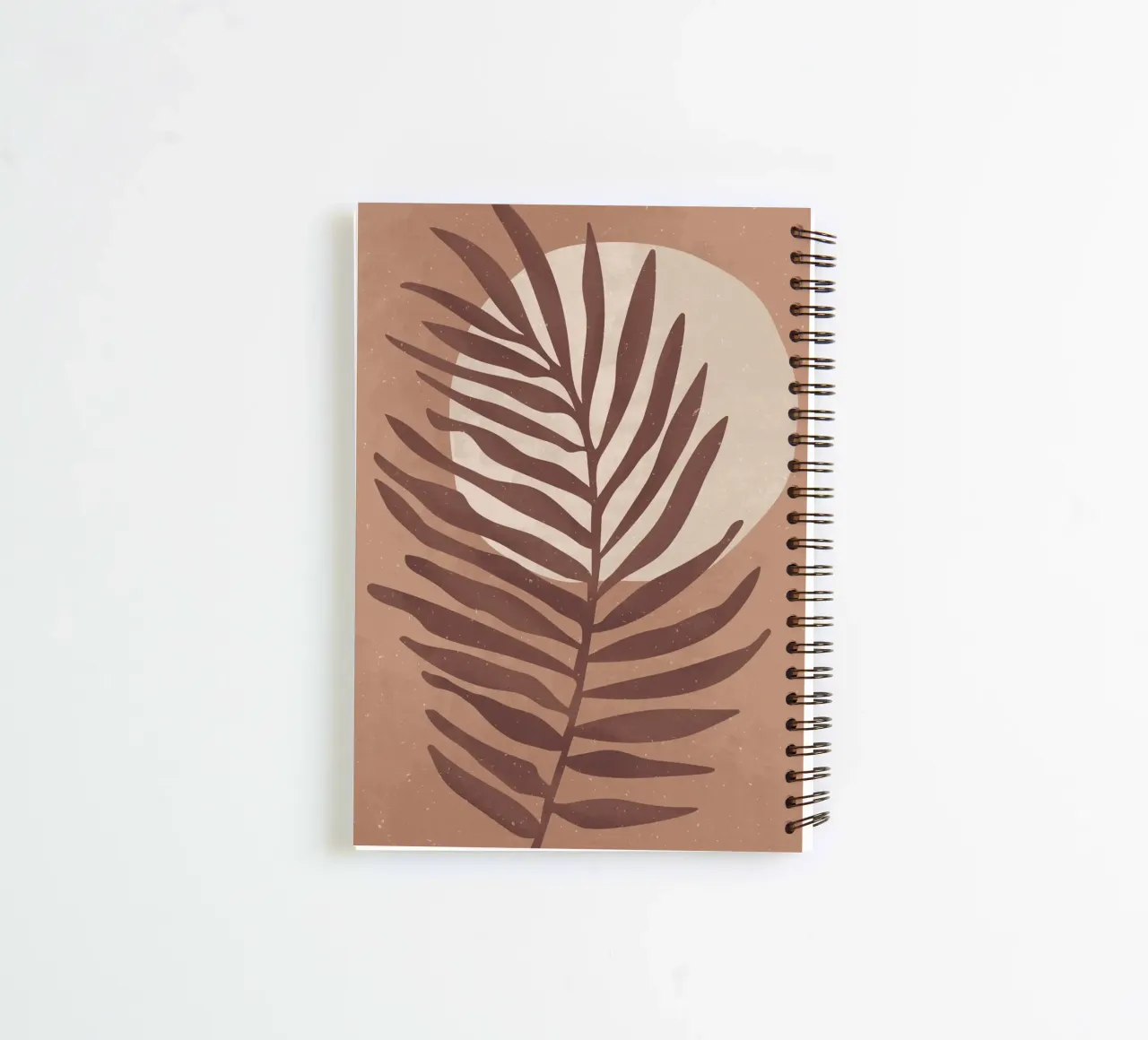 "Palm leaf in warm earth tones - nature & minimalism" spiral notebook by Whole©