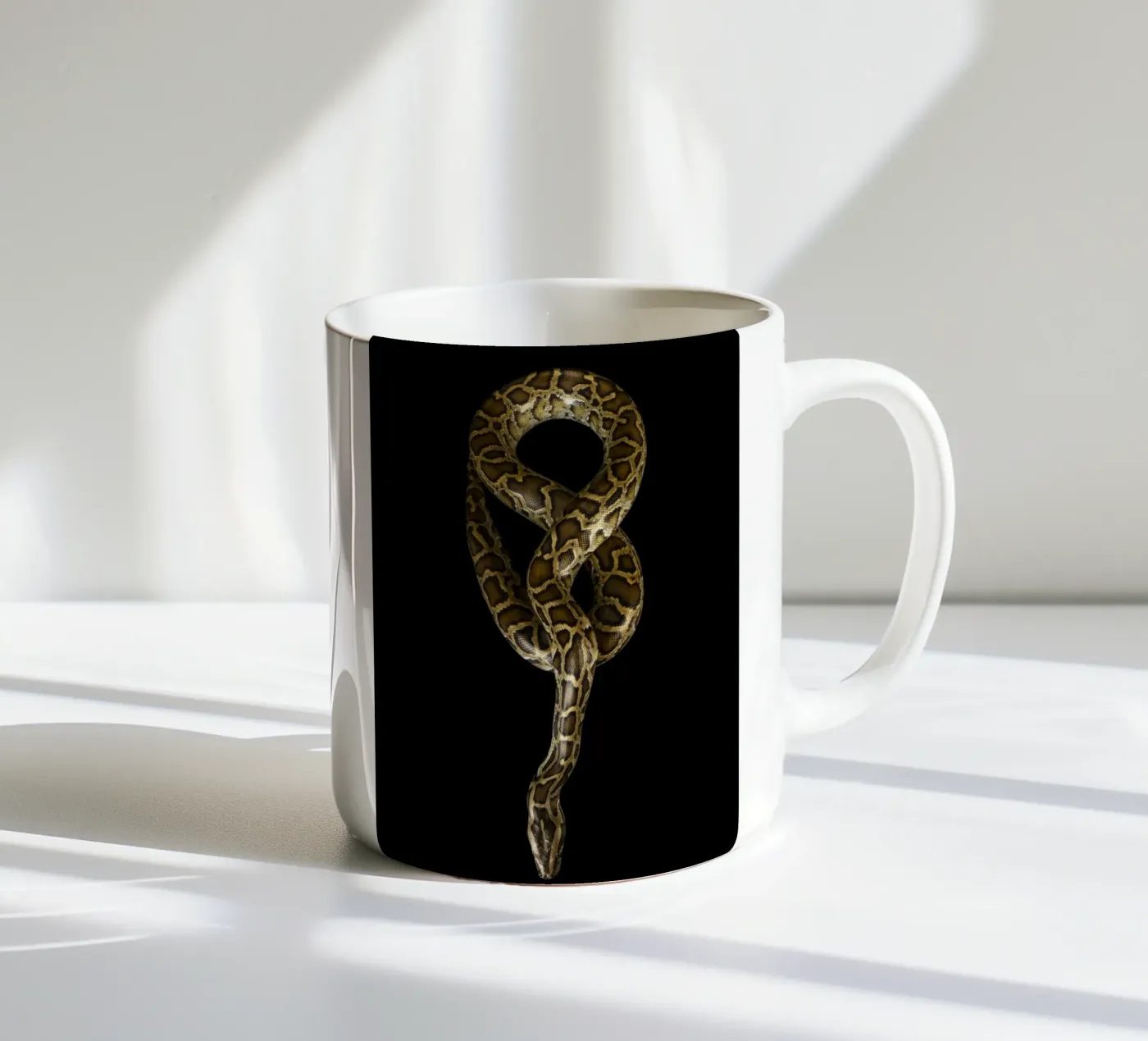 Python ceramic mug by Curious Collections by Marielle Leenders