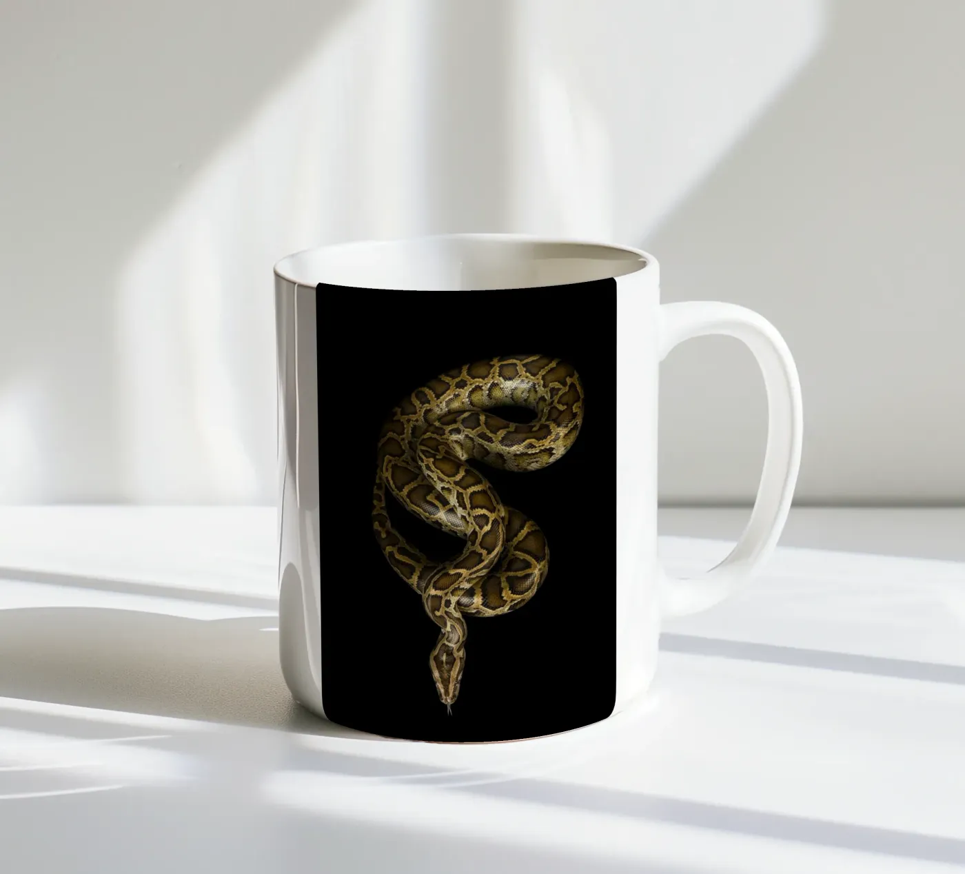 Python ceramic mug by Curious Collections by Marielle Leenders