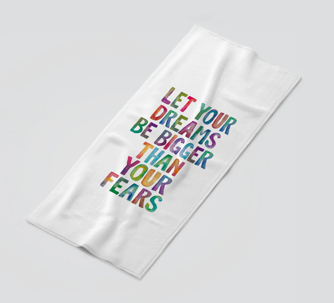Let Your Dreams Be Bigger Than Your Fears Rainbow Design beach towel by THE MOTIVATED TYPE