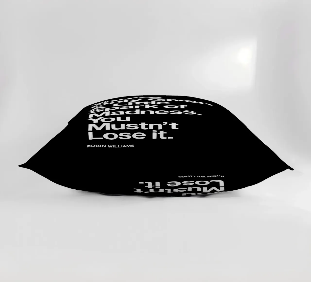 Ti viene data solo una piccola scintilla di follia Typografie cuscino da THE MOTIVATED TYPE