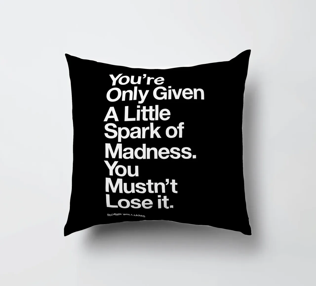 Ti viene data solo una piccola scintilla di follia Typografie cuscino da THE MOTIVATED TYPE