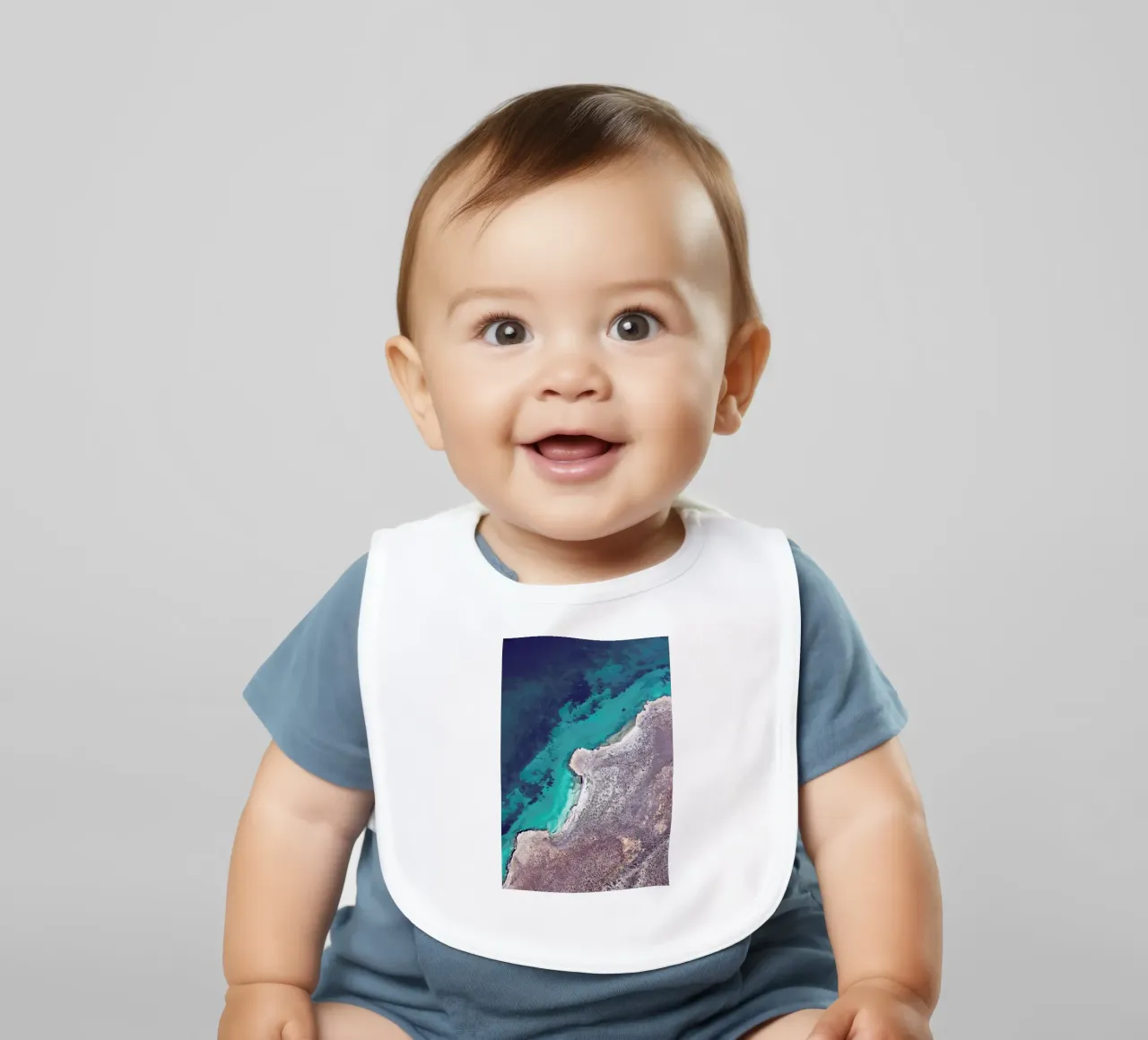 Shark Bay 9 baby bib by Simon Butterworth
